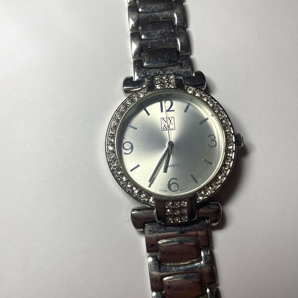 Silver tone women's watch with rhinestone